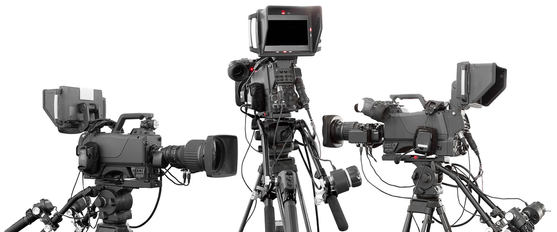 Three broadcast-style cameras on tripods.