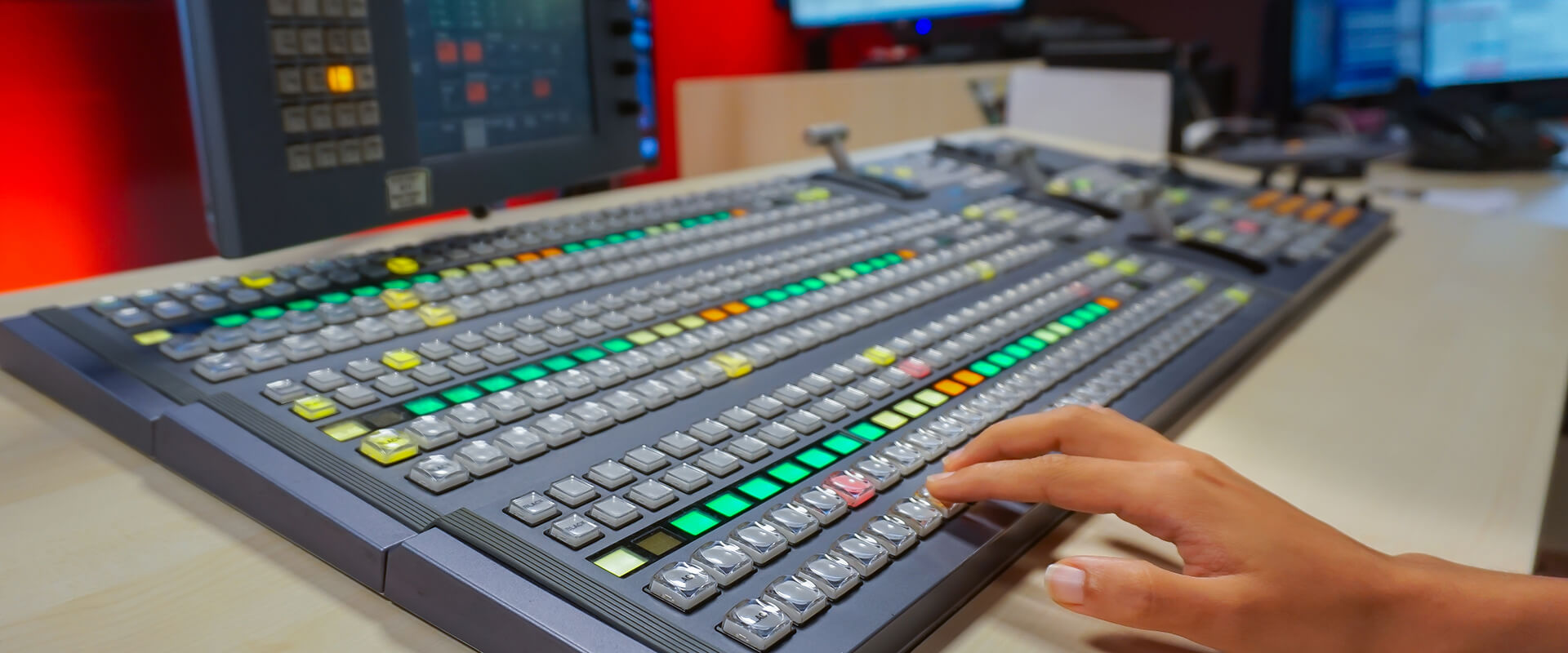 Hardware vision mixer located in a TV control room.